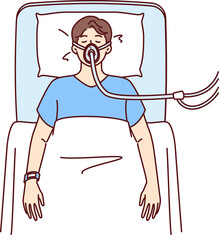 Sick man lies unconscious in hospital bed and receives air through ventilator due to heart attack