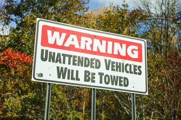 No Parking sign against an urban backdrop, a symbol of restricted access and order in the city