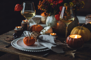 Cozy festive holiday table decor for home family Thanksgiving dinner. Traditional event, elegant...
