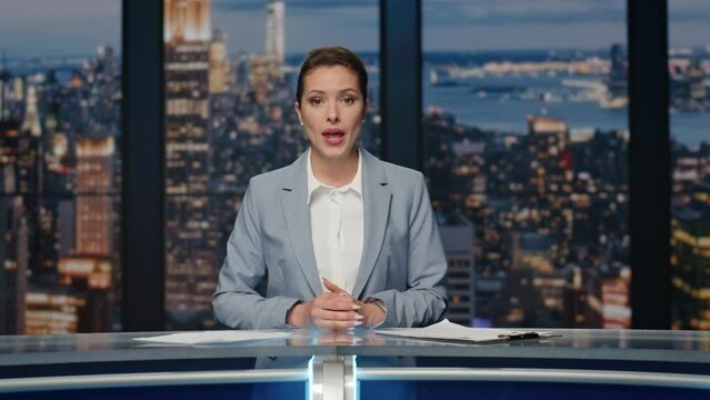 Cheerful lady announcer talking news at studio closeup. Woman ending broadcast