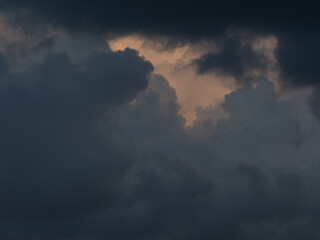 a dark cloud is creeping over the blue sky. Beautiful Cumulus clouds flying across the sky, Beautiful natural clouds move quickly across the sky, deep blue sky
