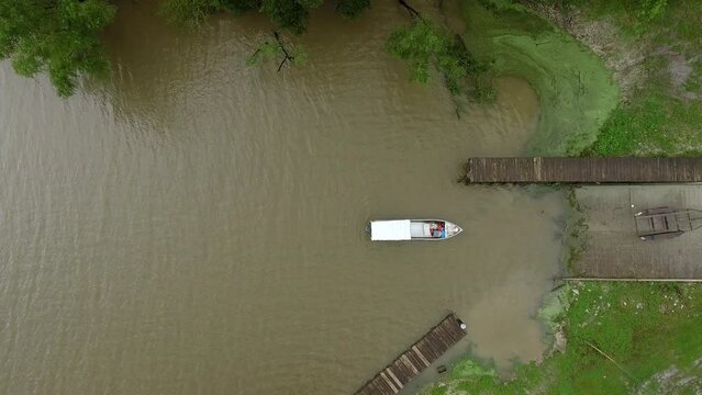 Aerial Top Downward Shot Of Boat Floating On River - Bayou, Louisiana