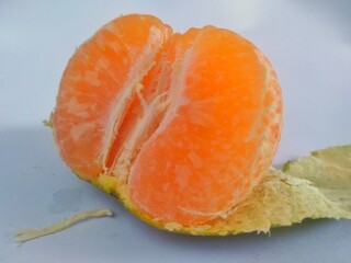 Fresh peeled orange on white background, Fruit full of vitamin C
