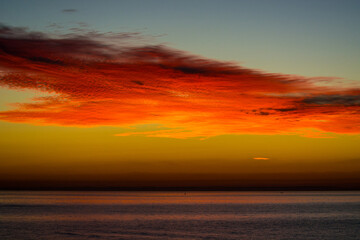 Fototapeta na wymiar pre-dawn clouds over the ocean