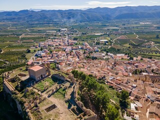 Fototapeta na wymiar Aerial view of Montesa village surrounded by buildings