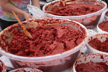 Homemade Tomato Paste in Large Containers. Traditional Fresh Tomato Paste for Sale at a Market
