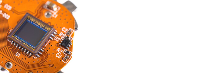 CMOS RGB image sensor isolated on white background. CCD sensor of compact digital camera. Close up, macro, copy space. Technology concept wallpaper banner