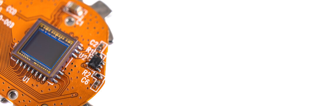 CMOS RGB image sensor isolated on white background. CCD sensor of compact digital camera. Close up, macro, copy space. Technology concept wallpaper banner