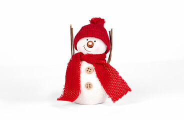 snowman with a cap and a red scarf on white background, christmas and new year celebration.