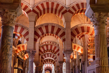 Columns and arches inside the mosque-cathedral of Córdoba, Spain.