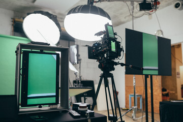 Film set, monitors and modern shooting equipment.