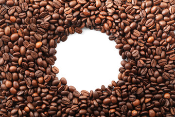 Frame of roasted coffee beans on white background, top view