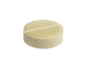 One round pill on white background. Medicinal treatment