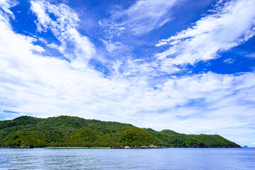 Tropical islands on a sunny, blue sky. Romblon Island, Philippines