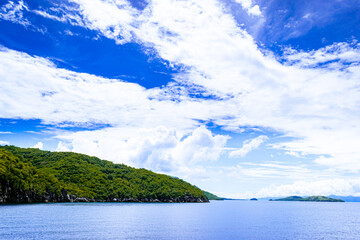 Tropical islands on a sunny, blue sky. Romblon Island, Philippines