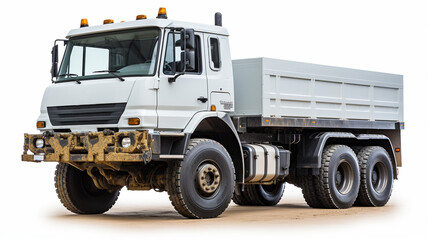 white dump truck parked on dirt road with large off-road tires, loaded with gravel, designed for heavy load transport