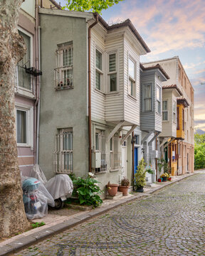 Cobblestone alley with traditional colorful wooden houses, suited in Kuzguncuk neighborhood, Uskudar district, Istanbul, Turkey