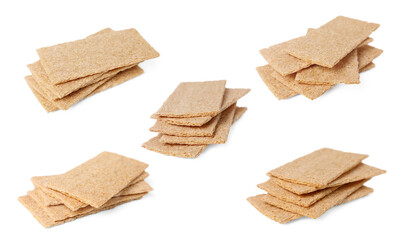 Tasty crunchy crispbreads on white background, collection