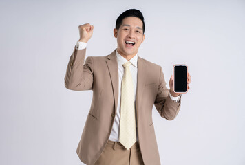 Image of Asian male businessman using phone on white background