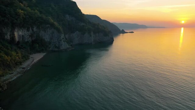 Lava landscape and the Black Sea. Guzelcehisar is famous for its lava basalt columns. The columns were viewed with a drone at sunset. Amasra, Bartin, Turkey