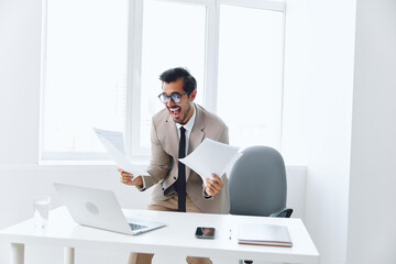 Businessman holding planning paper happy