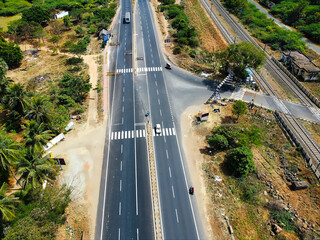 Bright aerial picture of highway in a desert 