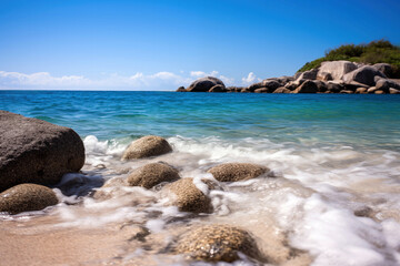 Beautiful seascape with pebble beach and blue sky background. High quality photo