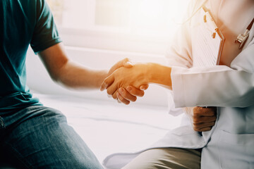 Fototapeta premium Male patient having consultation with doctor or psychiatrist who working on diagnostic examination on men's health disease or mental illness in medical clinic or hospital mental health service center