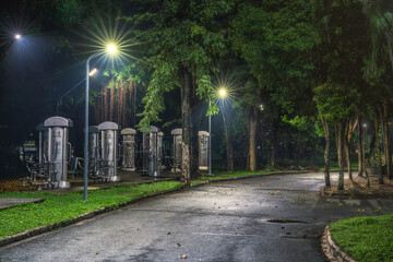 Obraz premium Exercise equipment or Outdoor fitness equipment in the park at night.