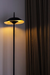 Illumination floor lamp at nighttime.