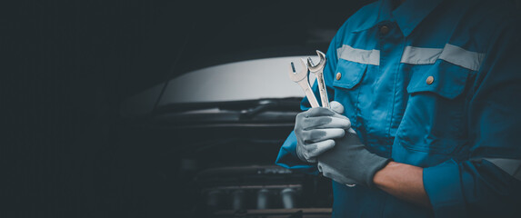 Car care maintenance and servicing, Hand technician auto mechanic using the wrench to fix car or repairing change spare part engine problem and insurance service support the range of car check. - obrazy, fototapety, plakaty