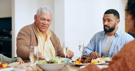 Food, holidays and a family at the dinner table of their home together for eating a celebration meal. Love, thanksgiving and a group of people in an apartment for festive health, diet or nutrition