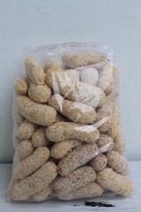 Indonesian snack called mancung in plastic on the table