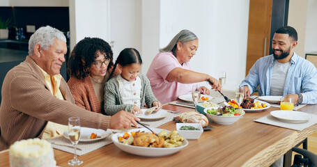 Happy family, food and smile in dining room of home for dinner, lunch or event for bonding and...