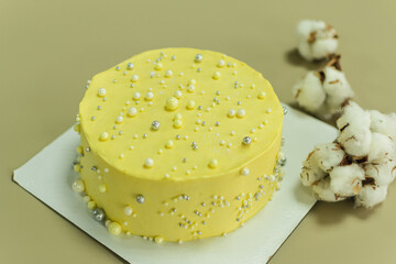 bright yellow cake for the holiday. birthday pastries. wedding cake