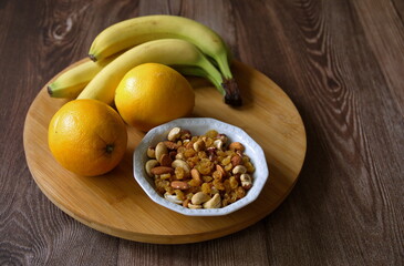 High angle view of various fruits on wooden background