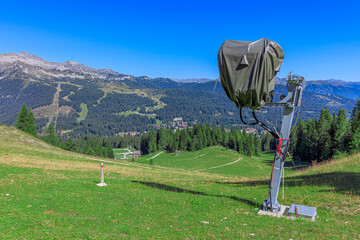 Snow cannon on the ski slope in summer