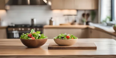 Poster Wooden tabletop counter with salad in kitchen. © Smile Studio AP