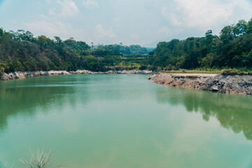 Aerial photo of a river that resembles a lake during the long dry season. Drone photo showing a clear river that doesn't flow until it finally becomes a puddle that resembles a lake