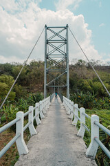 A suspension bridge that can only be used by two-wheeled vehicles and can only be crossed in turns....
