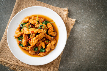 stir-fried fried fish with basil and chili in thai style