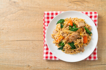 Fried rice with pork on plate