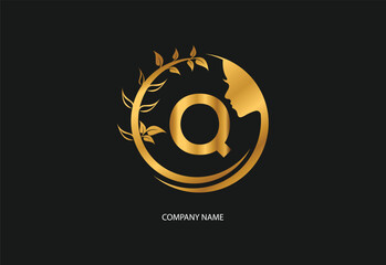 Fototapeta premium Beauty logo initial letter Q with golden style color and leaf. Natural beauty logo template