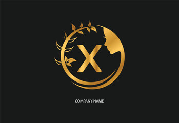 Beauty logo initial letter X with golden style color and leaf. Natural beauty logo template