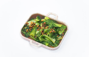 Baby Bok choy or Chinese cabbage in oyster sauce. Chinese food. closeup photo