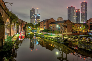 The Castlefield area in Manchester, UK, at night - 676667103