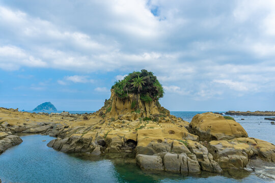 The landscape of the coastal rock at Heping Island Park in Keelung City, Taiwan, Keelung Islet is just in the back.