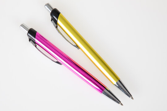 ballpoint pencil simple two ballpoint pens pink yellow colors on white background