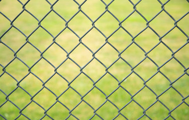 Fototapeta premium Chain link fence in outdoor background.