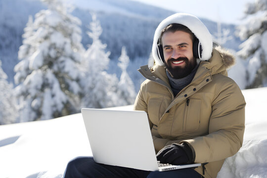 Happy Man Working Remotely On Laptop On Winter Vacation